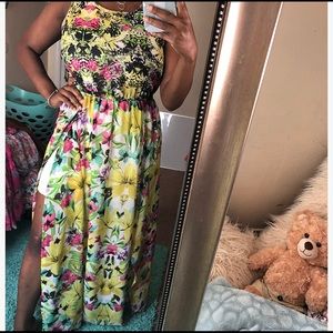 A multicolored floral printed two slitted dress